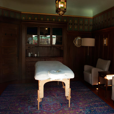 Treatment room at East West SF Bernal in San Francisco with massage table.